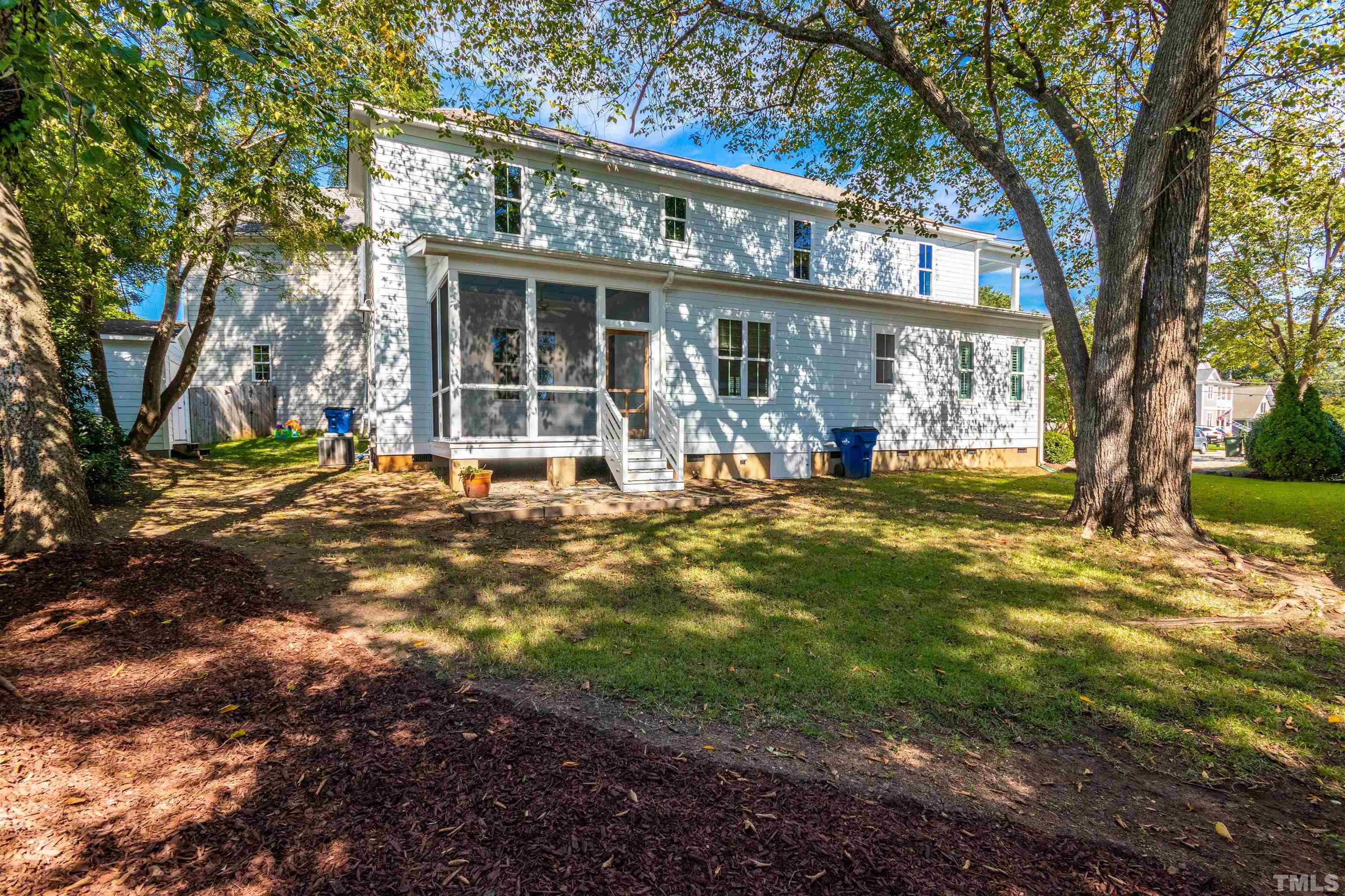 610 New Road Raleigh, NC 27608 - Photo 22 of 24 a front view of a house with a yard