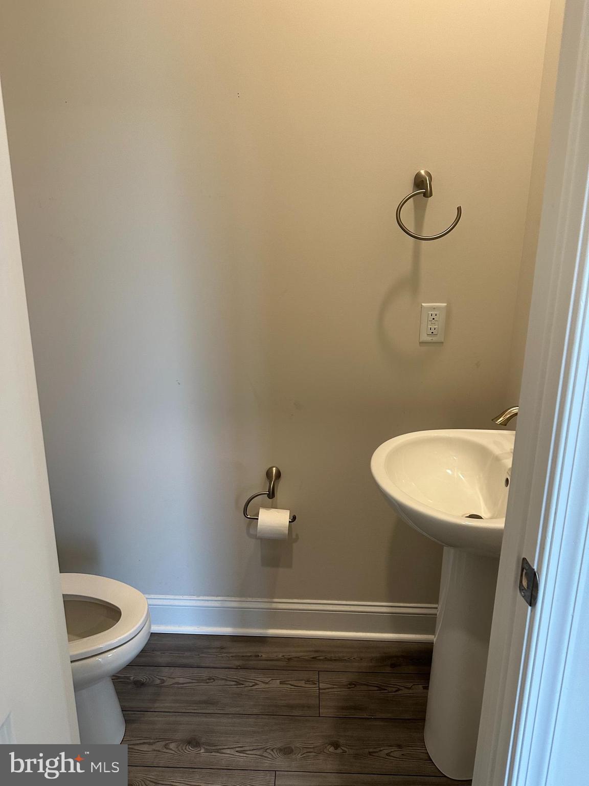 35422 Wright Way Millsboro, DE 19966 - Photo 17 of 35 a bathroom with a toilet and a mirror