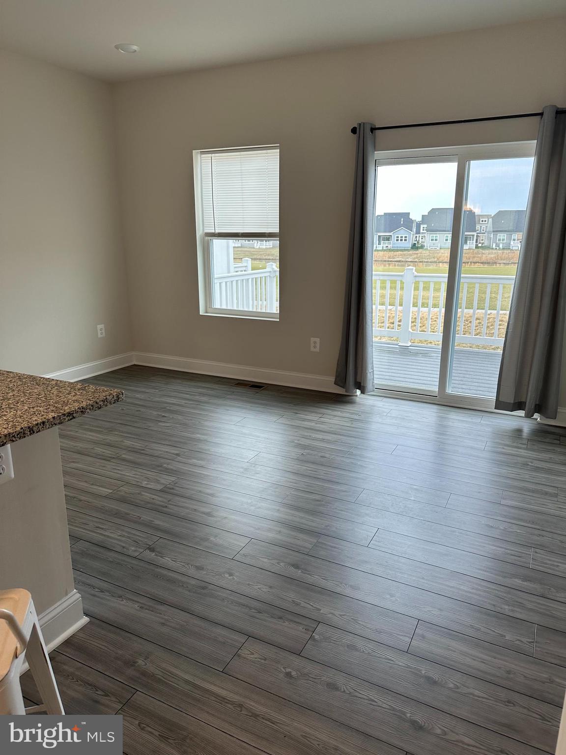 35422 Wright Way Millsboro, DE 19966 - Photo 9 of 35 wooden floor in an empty room with a window
