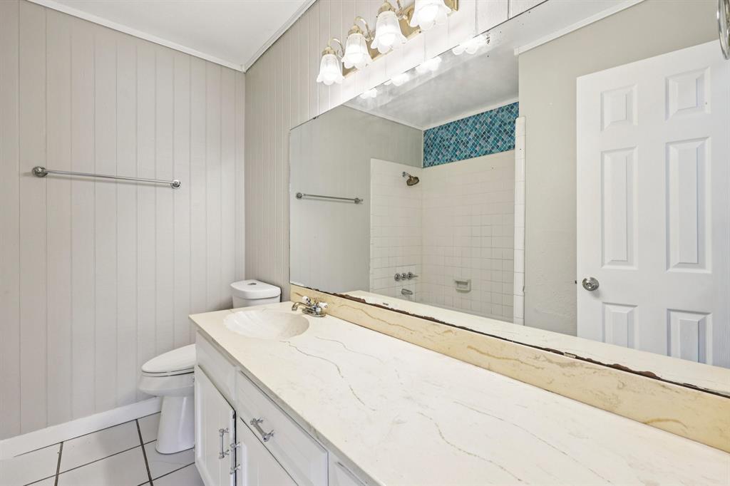 337 Apache Trail Keller, TX 76248 - Photo 14 of 36 a bathroom with a double vanity sink and a mirror