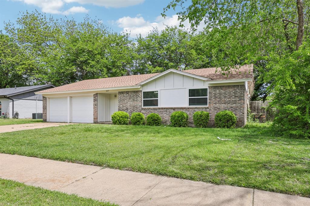 337 Apache Trail Keller, TX 76248 - Photo 2 of 36 a front view of a house with a yard