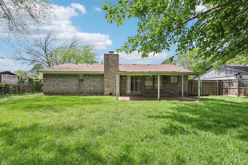 337 Apache Trail Keller, TX 76248 - Photo 22 of 36 a front view of a house with a garden