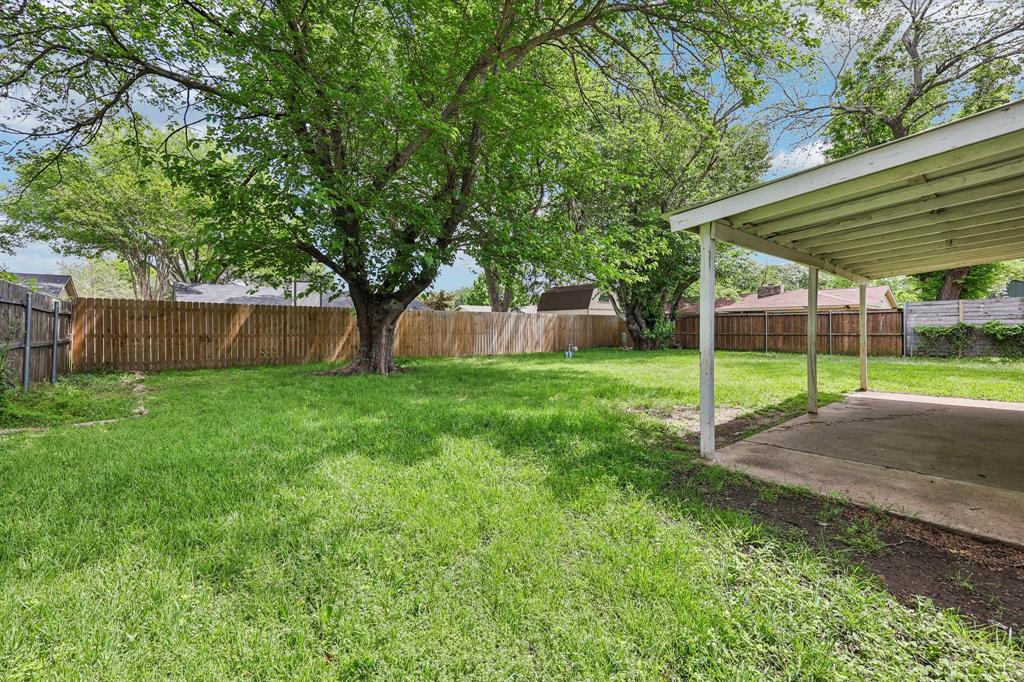 337 Apache Trail Keller, TX 76248 - Photo 24 of 36 a view of a house with backyard and a tree