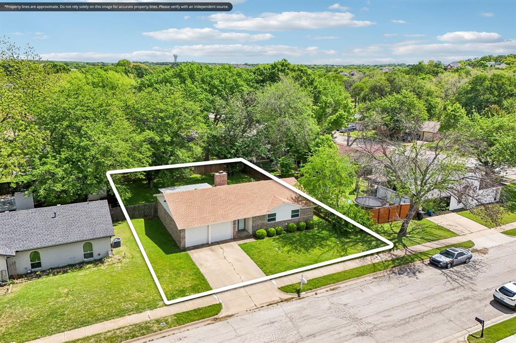 337 Apache Trail Keller, TX 76248 - Photo 27 of 36 a front view of a house with a yard