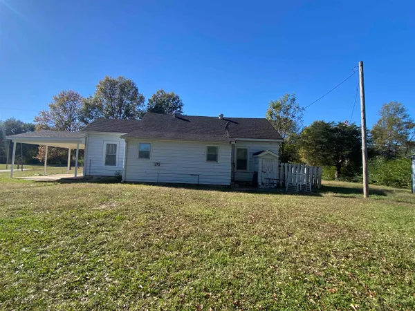 a house view with a garden space