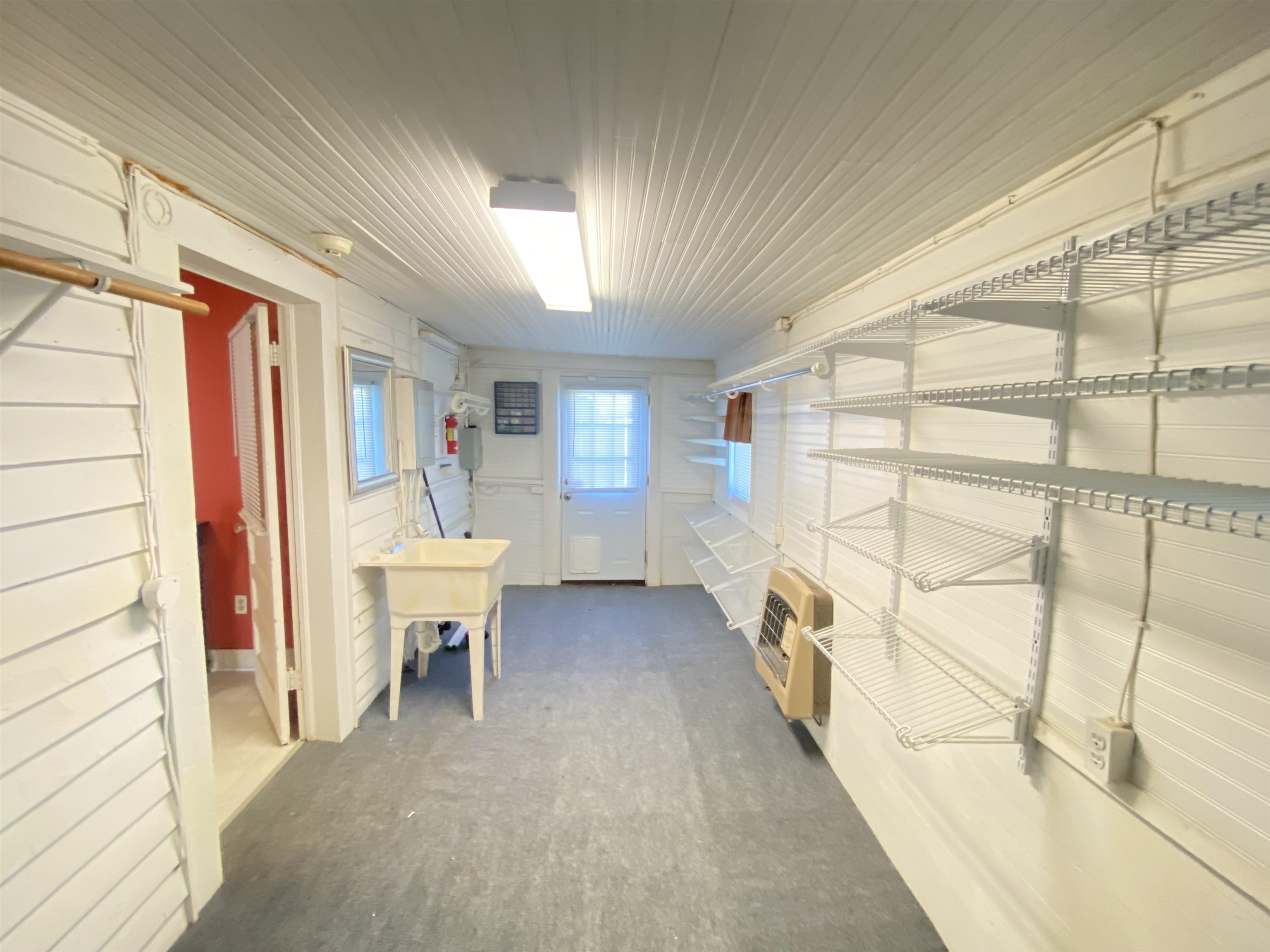 240 South Oak Street Adamsville, TN 38310 - Photo 18 of 29 a bed room with a bed and a chair