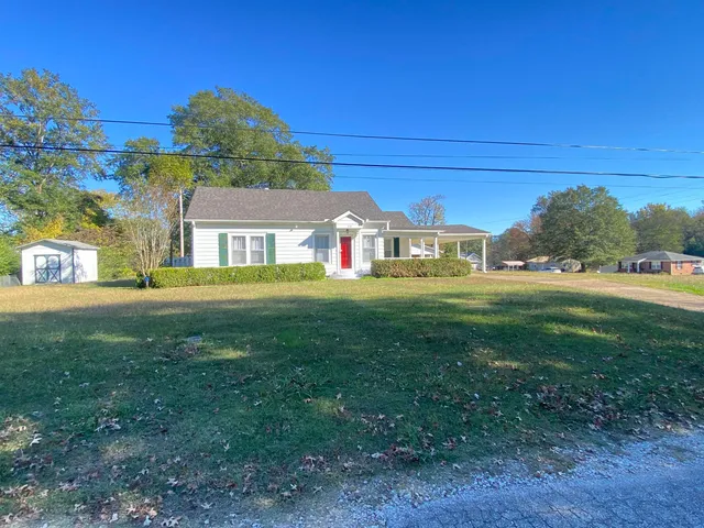 a house view with garden space