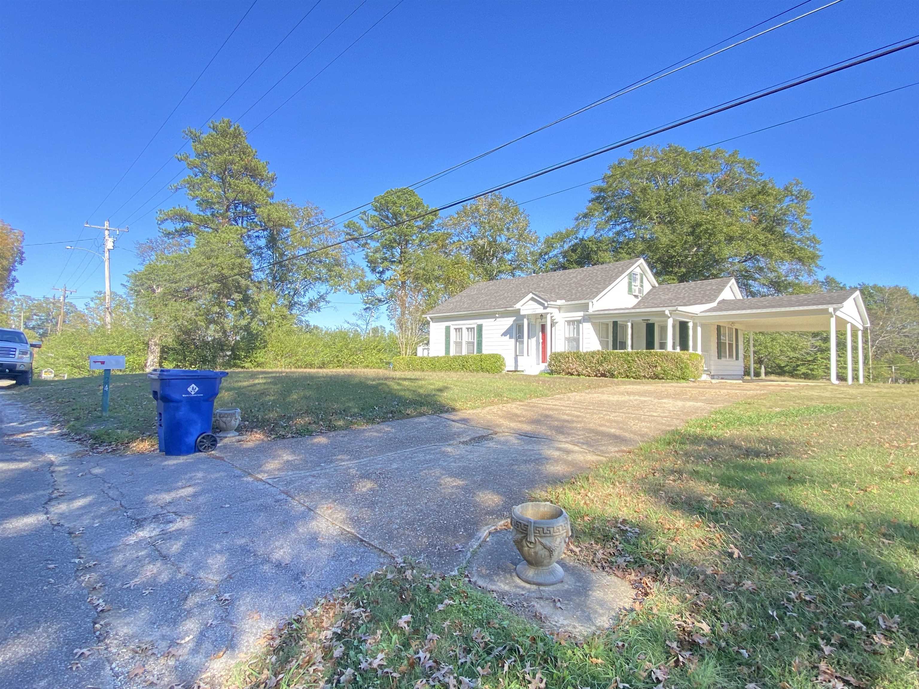240 South Oak Street Adamsville, TN 38310 - Photo 20 of 29 a house view with a garden space