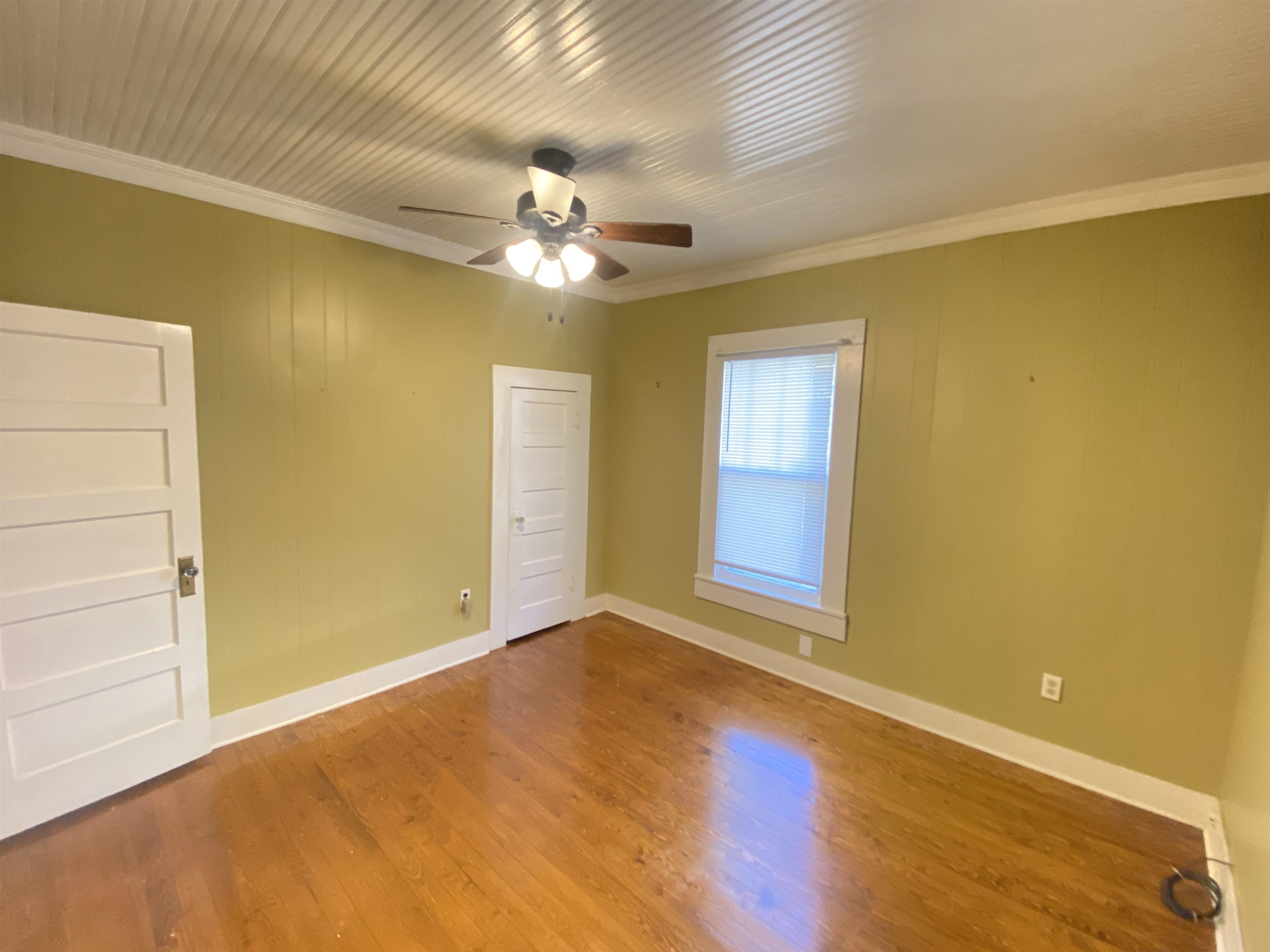240 South Oak Street Adamsville, TN 38310 - Photo 20 of 29 a view of an empty room with a window