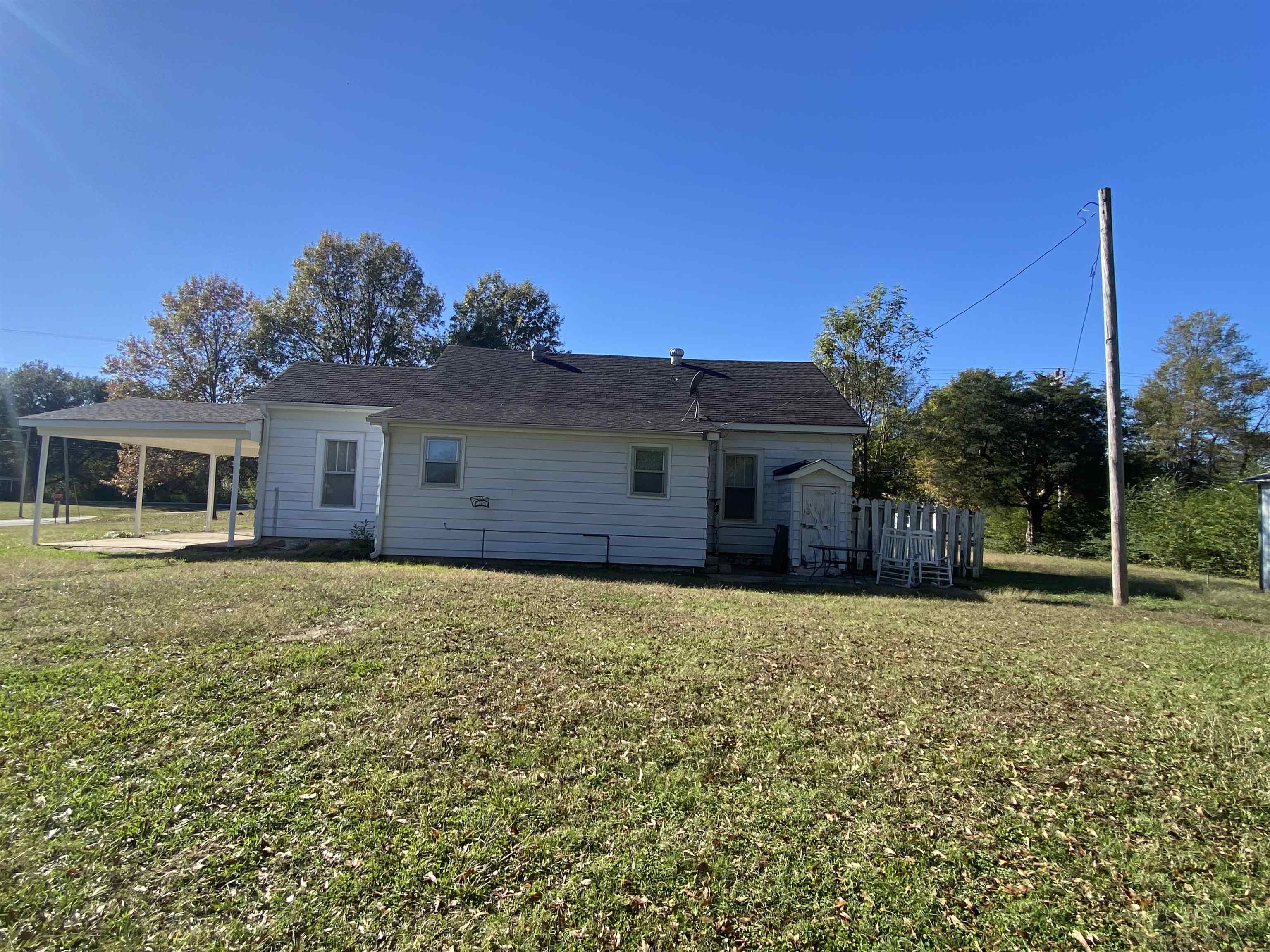 240 South Oak Street Adamsville, TN 38310 - Photo 24 of 29 a house view with a garden space