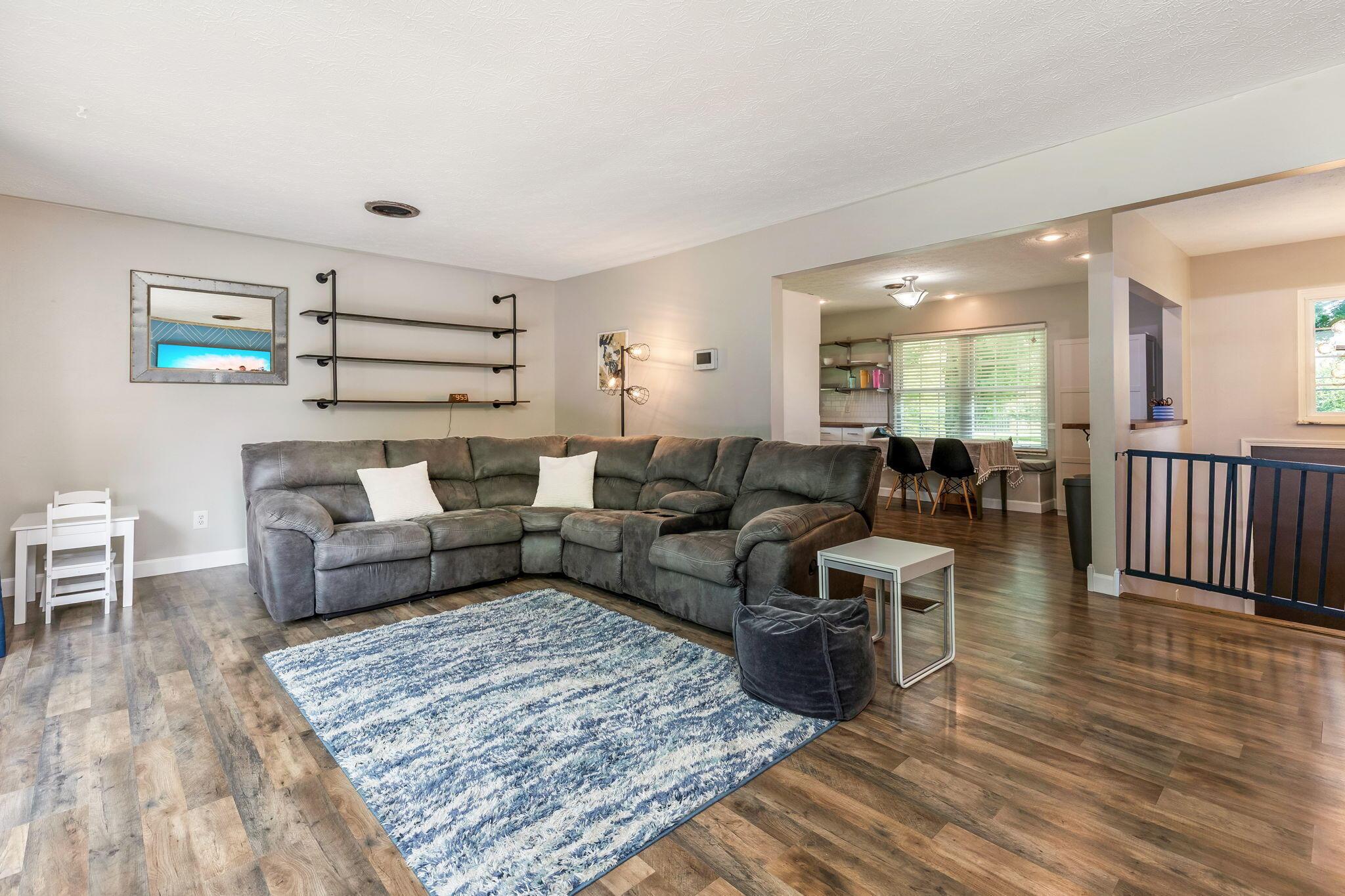 14823 Cleveland Road Southwest Pataskala, OH 43062 - Photo 5 of 57 Spacious living area featuring wood-finish flooring and a neutral color palette