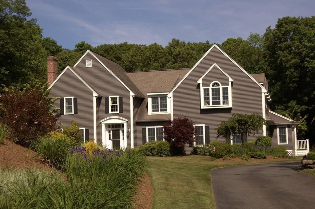 6 Powder House Lane Boxford, MA 01921 - Photo 2 of 30 a front view of a house with a yard