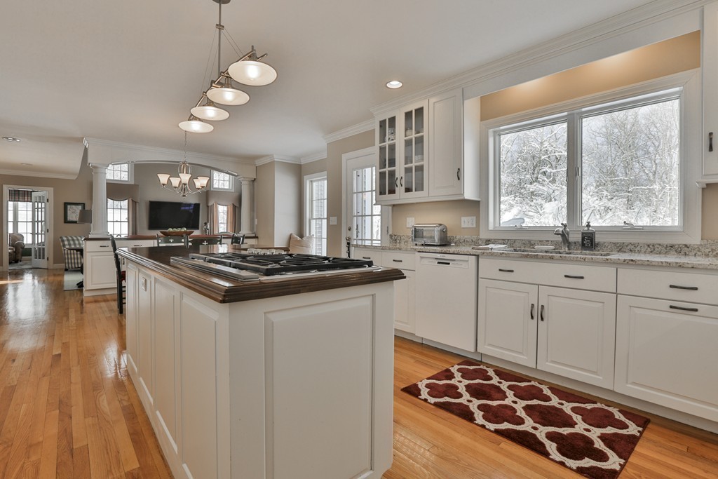 6 Powder House Lane Boxford, MA 01921 - Photo 7 of 30 a kitchen with stainless steel appliances granite countertop a stove and a sink