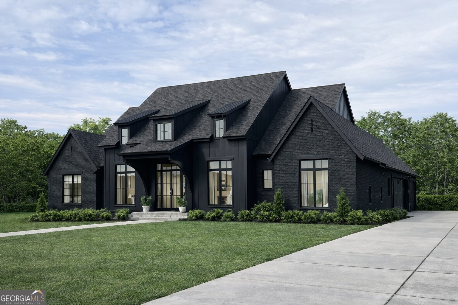 a front view of a house with a yard