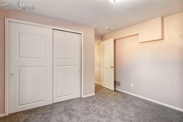3579 Indigo Ridge Point Colorado Springs, CO 80910 - Photo 22 of 33 Bedroom 3 in basement