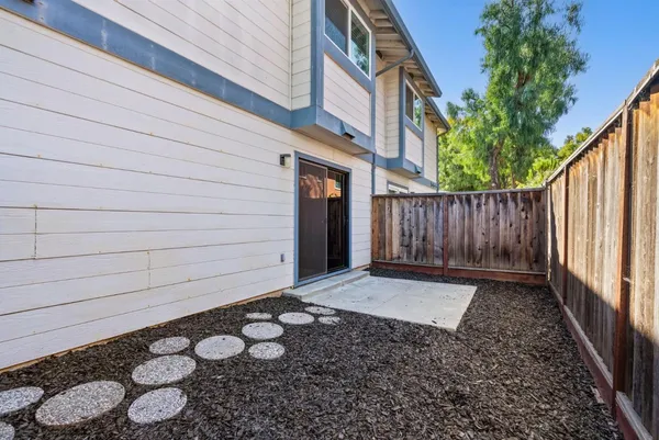 front view of a house with a garden