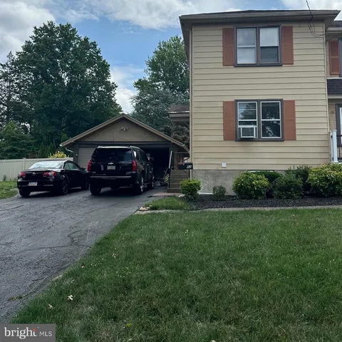 a car parked in front of a house