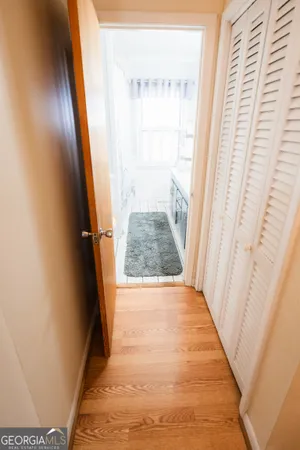 a bedroom with a bed couch and a window