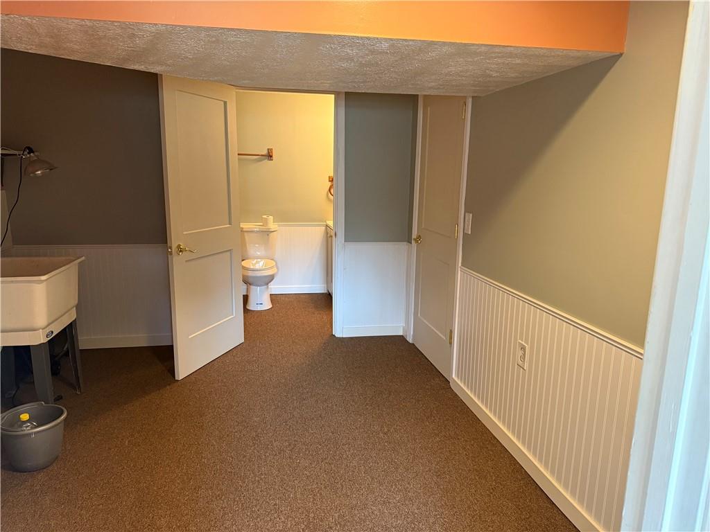 600 Moore Road Washington, PA 15301 - Photo 11 of 16 a view of a hallway with toilet and a shower
