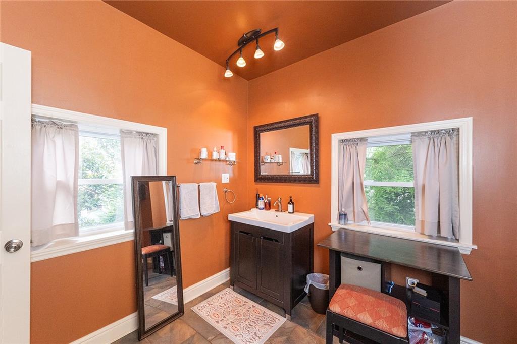 2220 Sarah Street, Unit 2 Pittsburgh, PA 15203 - Photo 12 of 34 a view of a workspace with furniture and a window