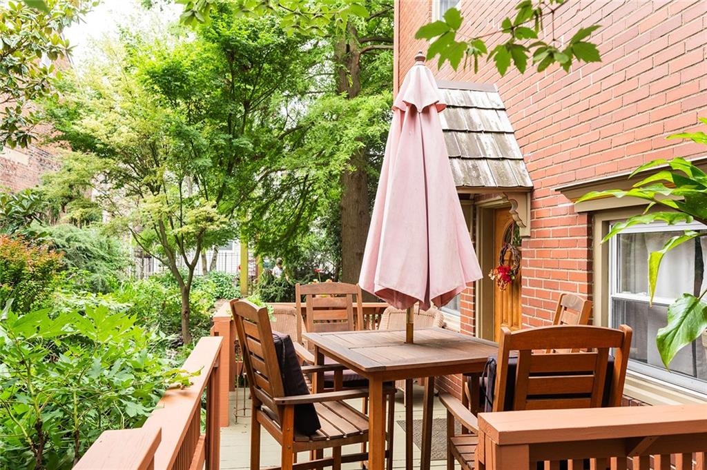 2220 Sarah Street, Unit 2 Pittsburgh, PA 15203 - Photo 18 of 34 a view of a patio with table and chairs and potted plants