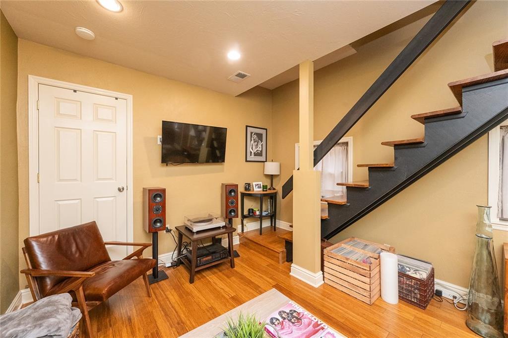 2220 Sarah Street, Unit 2 Pittsburgh, PA 15203 - Photo 7 of 34 a living room with furniture and a flat screen tv