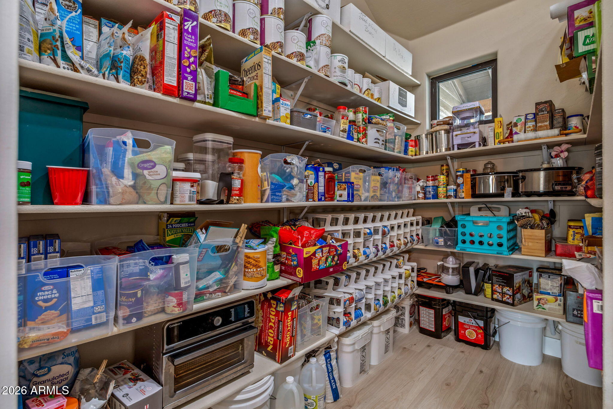 2270 Spitfire Circle Overgaard, AZ 85933 - Photo 26 of 47 a room with lots of books and a baby crib