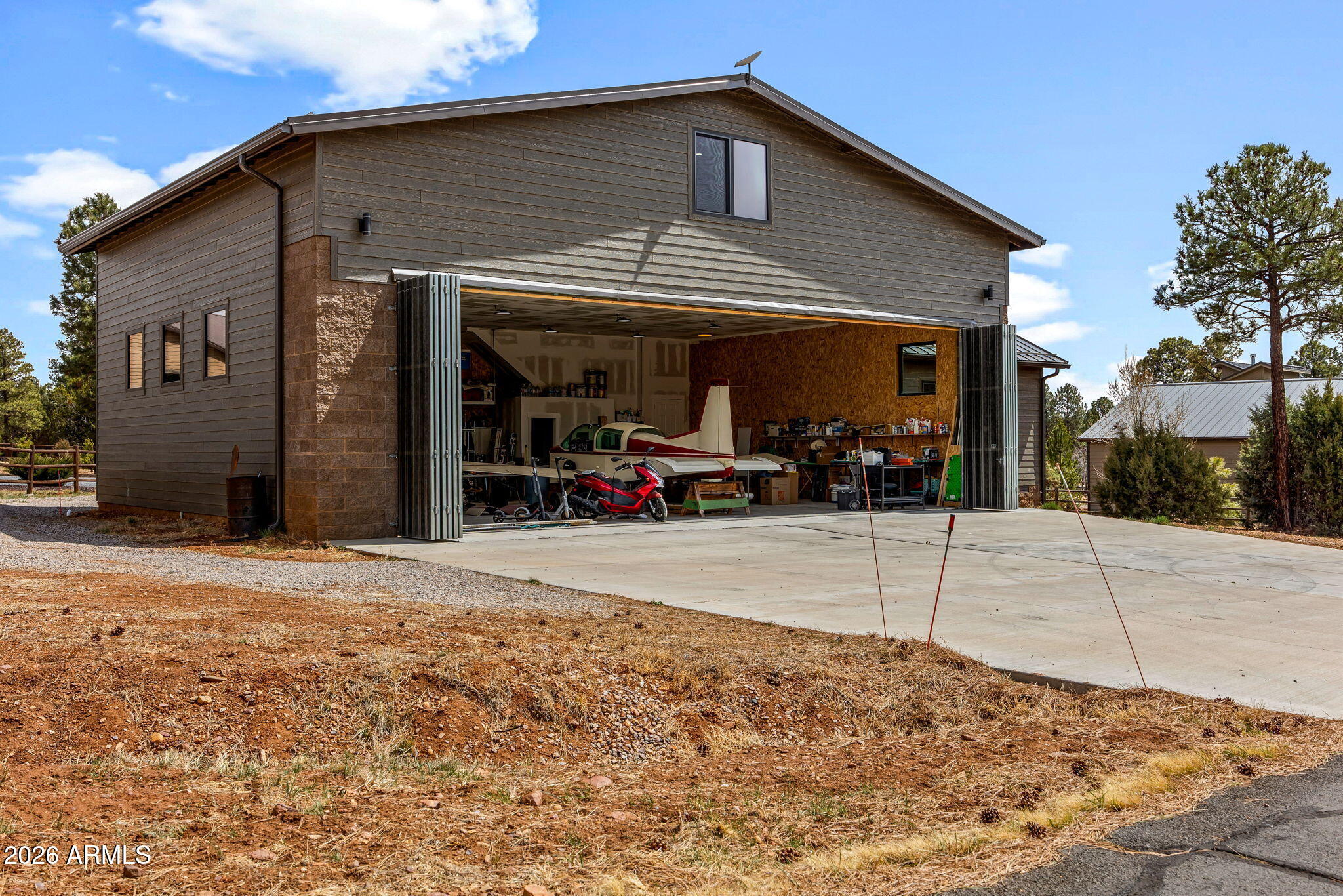 2270 Spitfire Circle Overgaard, AZ 85933 - Photo 35 of 47 a view of a house with a patio