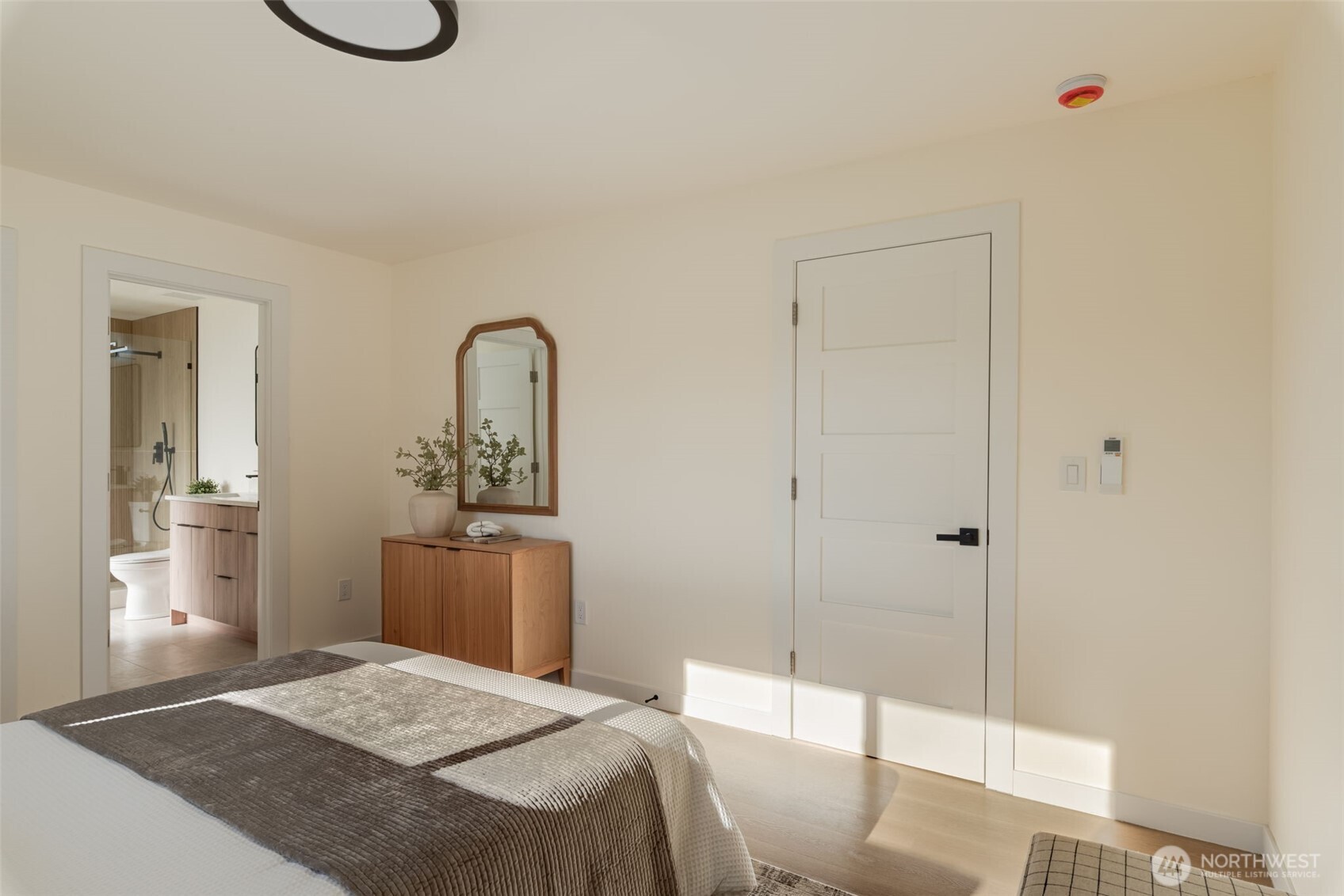 11010 Davisson Road Southwest Lakewood, WA 98499 - Photo 16 of 40 a bedroom with a bed and a dresser