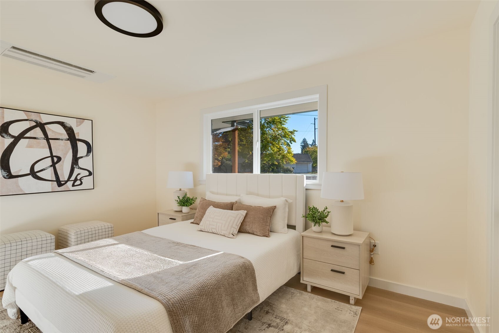 11010 Davisson Road Southwest Lakewood, WA 98499 - Photo 18 of 40 a bedroom with a bed and window