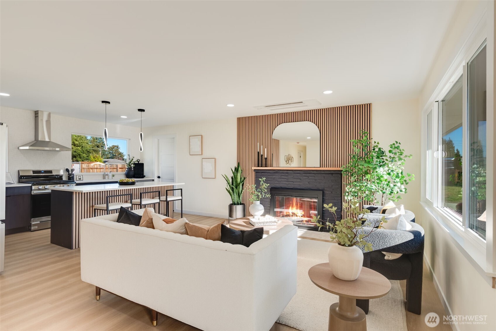 11010 Davisson Road Southwest Lakewood, WA 98499 - Photo 2 of 40 a living room with furniture and a fireplace