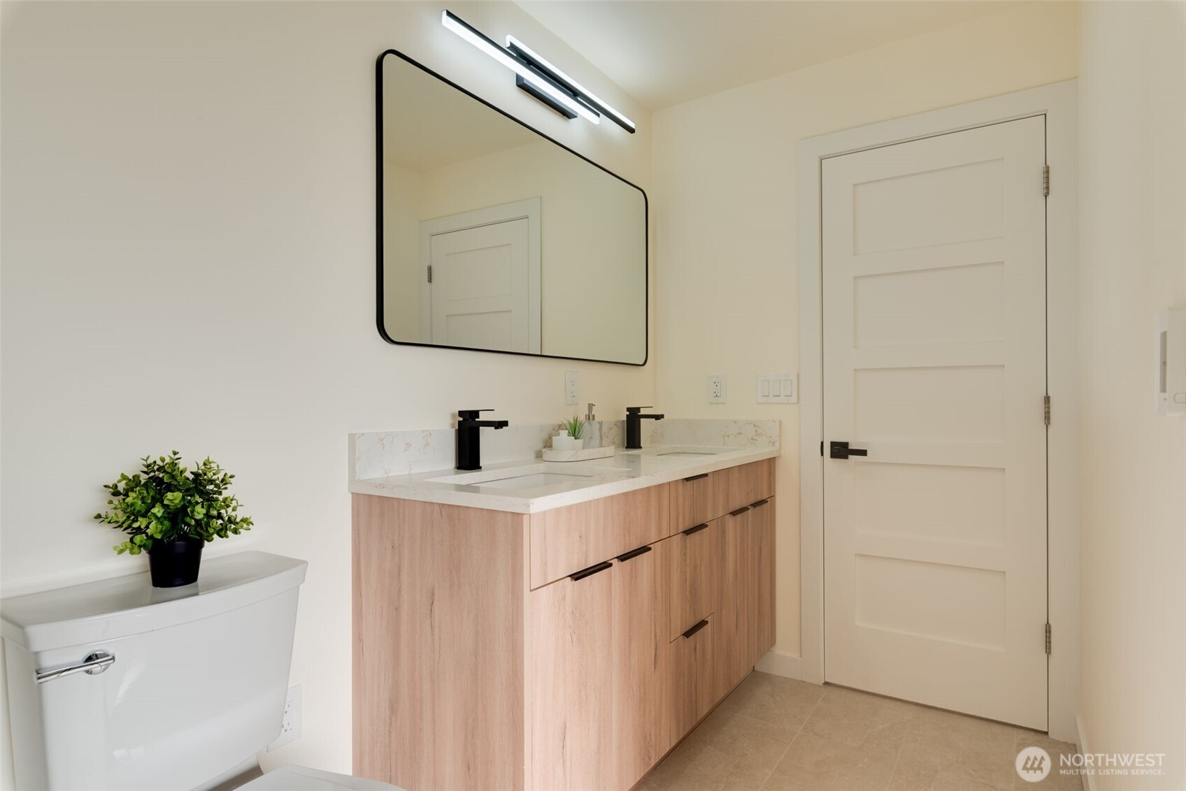 11010 Davisson Road Southwest Lakewood, WA 98499 - Photo 22 of 40 a bathroom with a sink vanity and a mirror