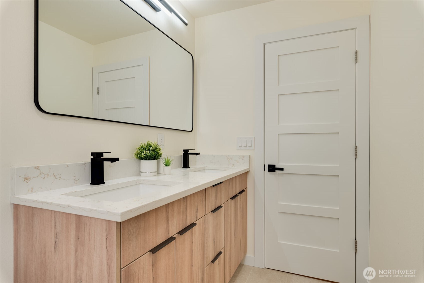 11010 Davisson Road Southwest Lakewood, WA 98499 - Photo 28 of 40 a kitchen with a sink and a mirror