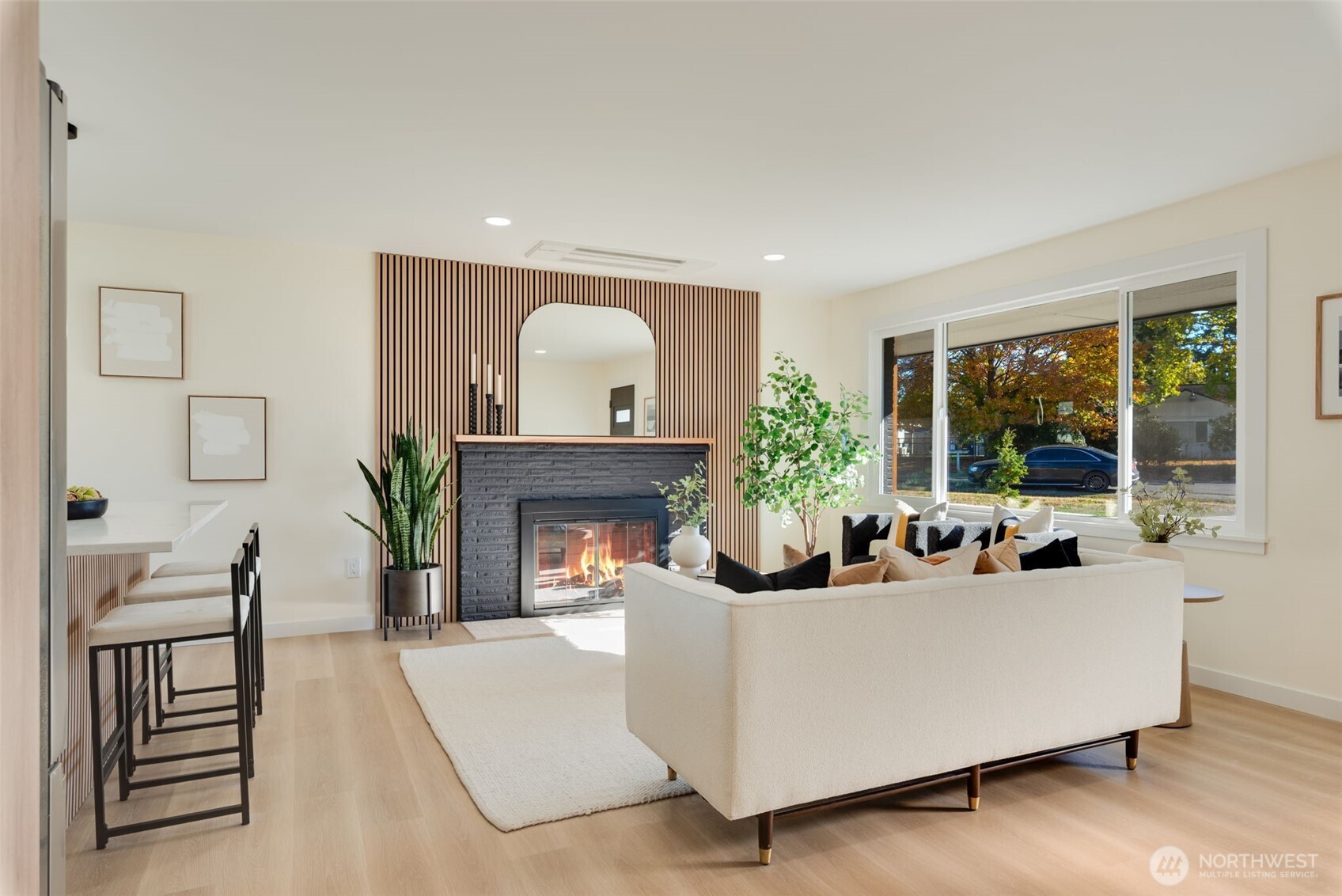 11010 Davisson Road Southwest Lakewood, WA 98499 - Photo 3 of 40 a living room with furniture and a fireplace