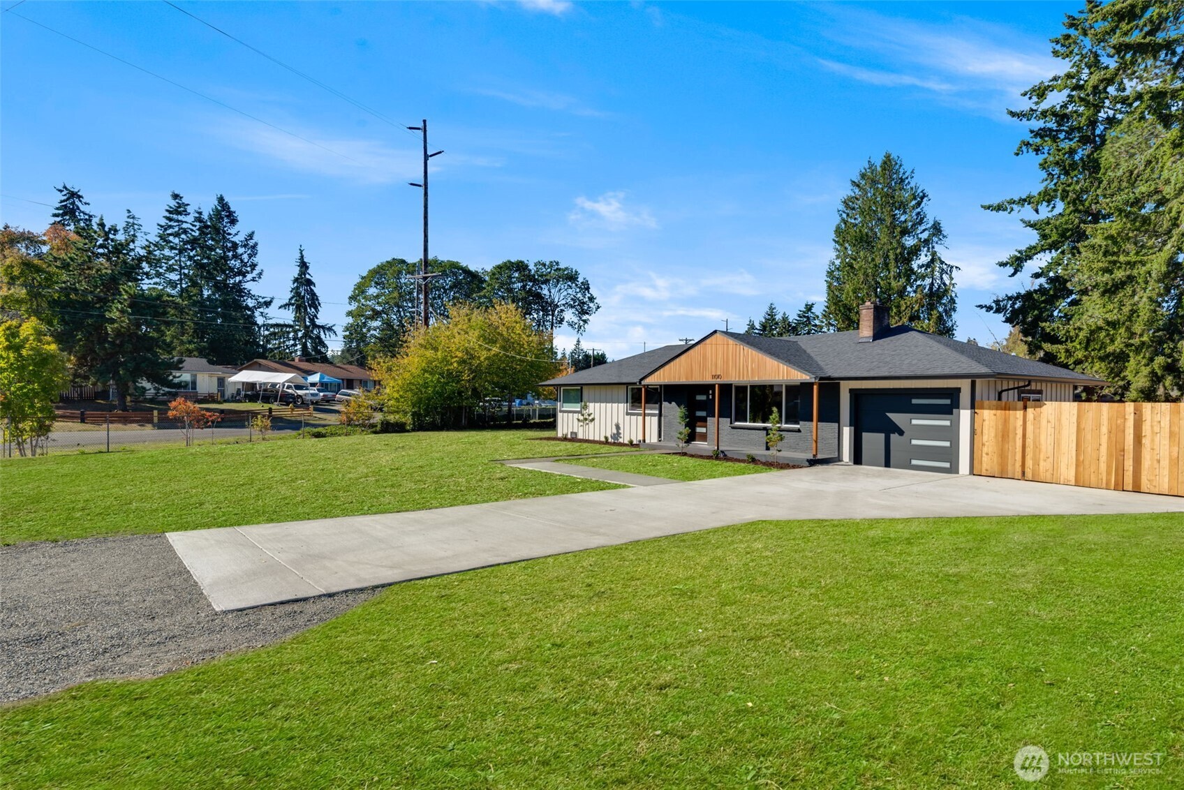 11010 Davisson Road Southwest Lakewood, WA 98499 - Photo 36 of 40 a backyard of a house with lots of green space