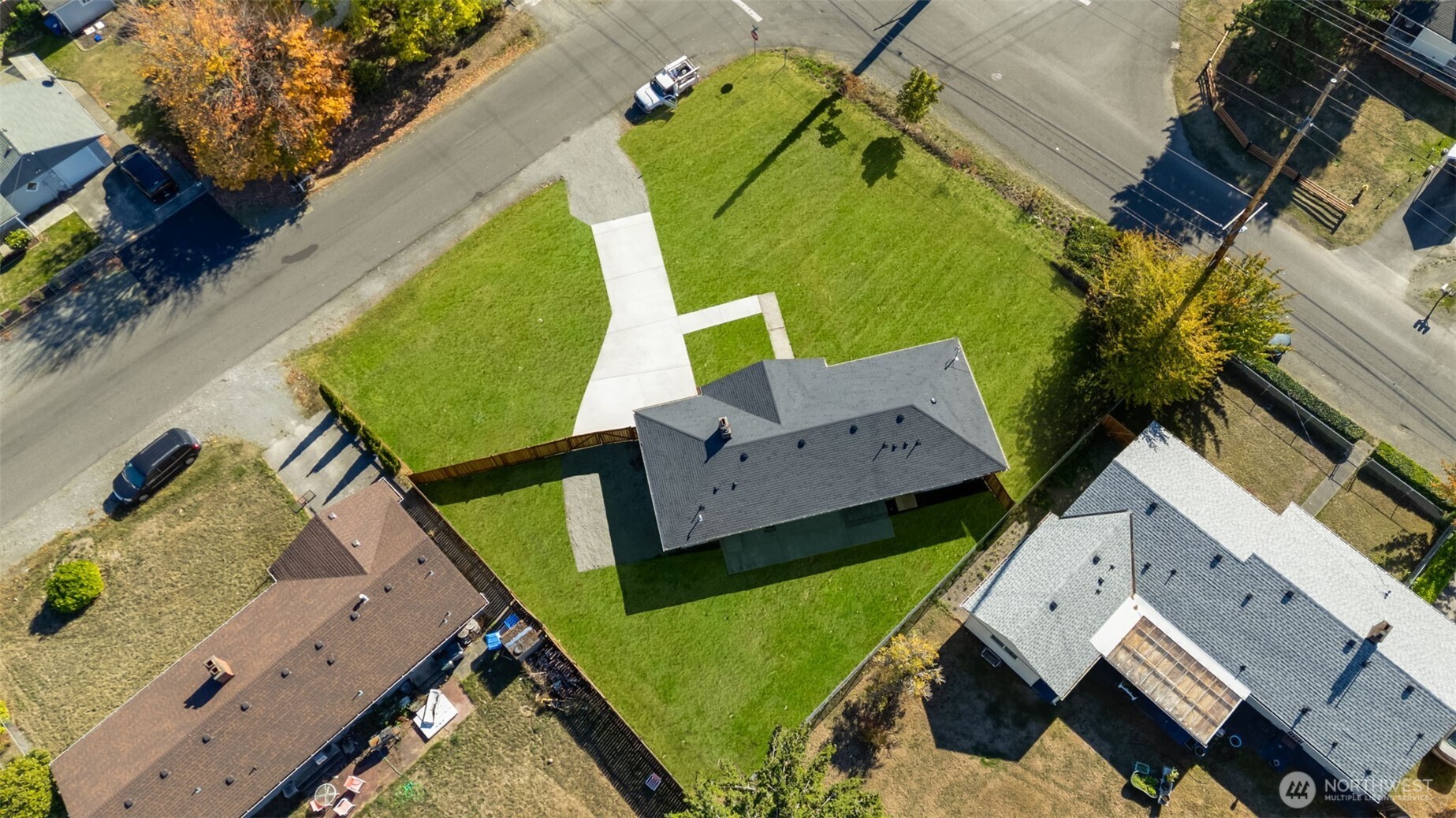 11010 Davisson Road Southwest Lakewood, WA 98499 - Photo 37 of 40 an aerial view of a house with a garden and swimming pool
