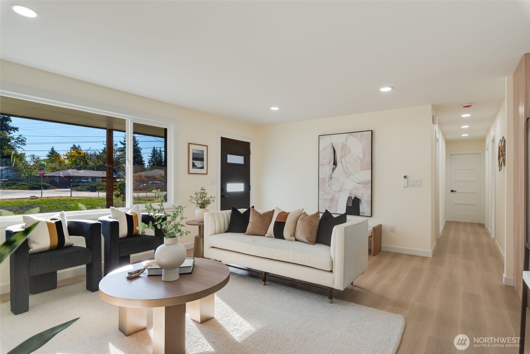 11010 Davisson Road Southwest Lakewood, WA 98499 - Photo 4 of 40 a living room with furniture and a large window