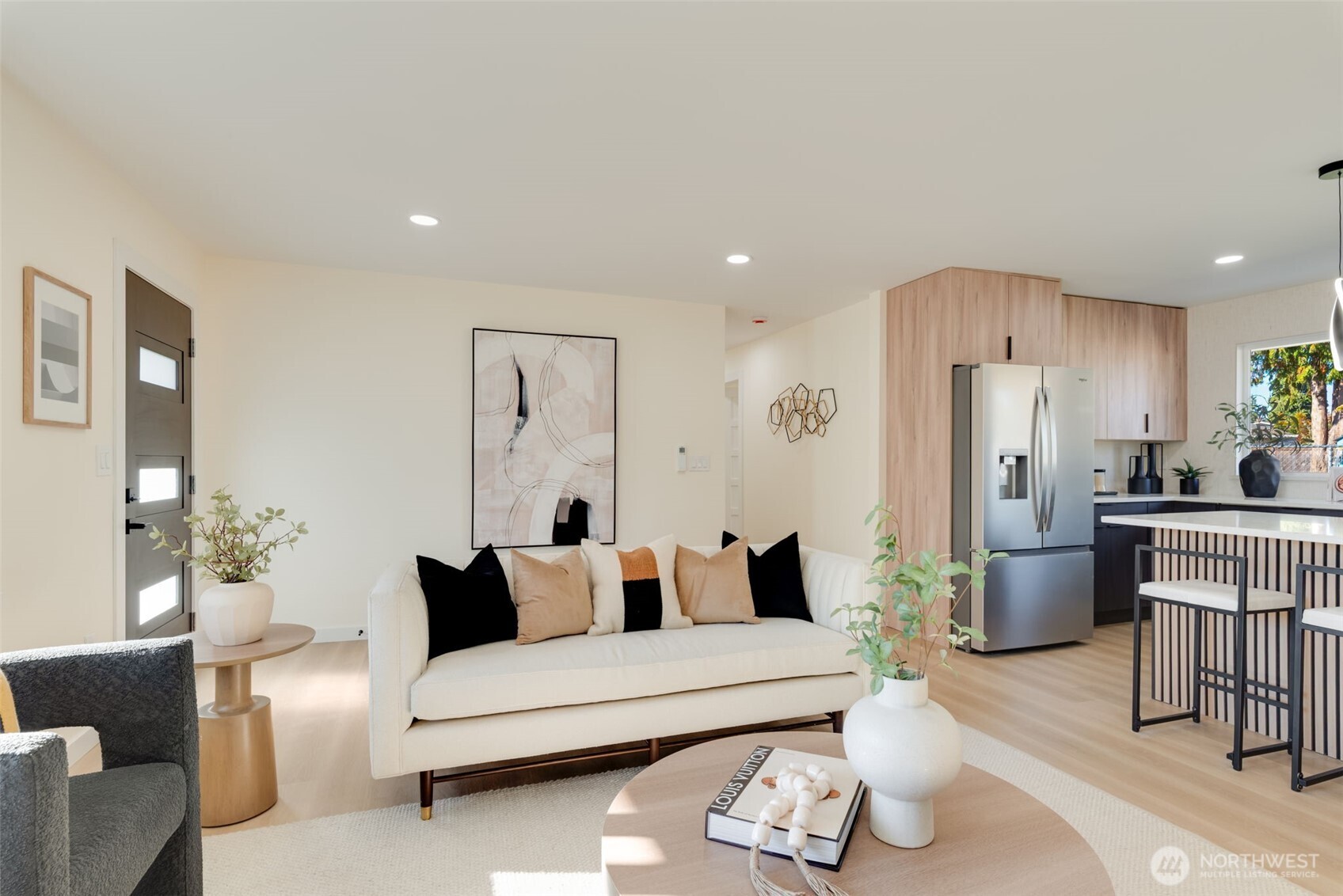 11010 Davisson Road Southwest Lakewood, WA 98499 - Photo 5 of 40 a living room with furniture kitchen and a refrigerator