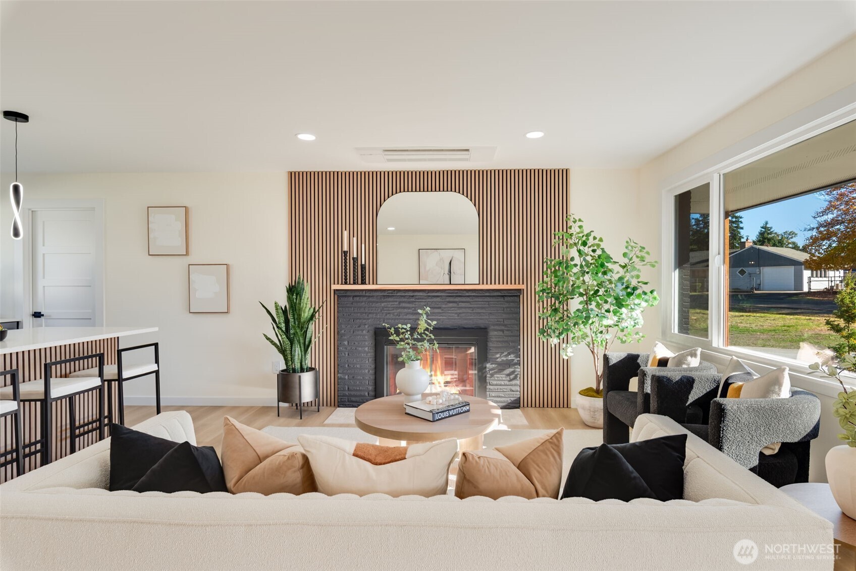 11010 Davisson Road Southwest Lakewood, WA 98499 - Photo 6 of 40 a living room with furniture and a fireplace