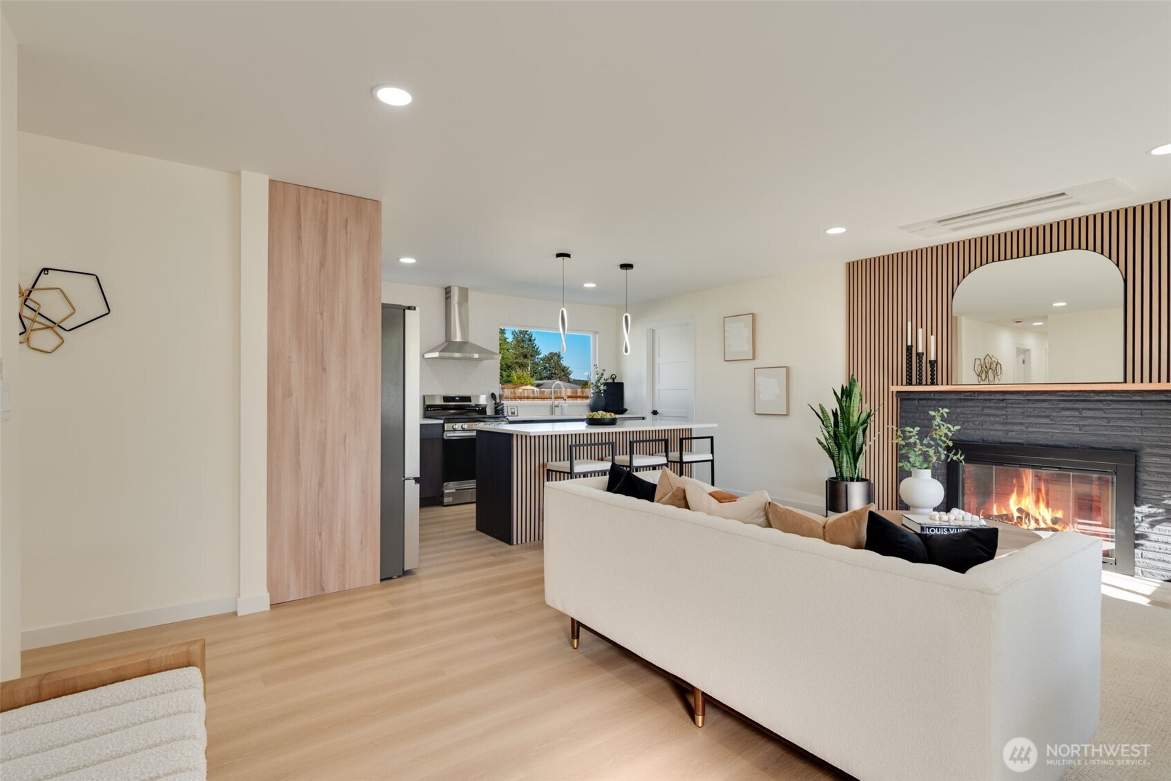 11010 Davisson Road Southwest Lakewood, WA 98499 - Photo 7 of 40 a living room with furniture and a fireplace