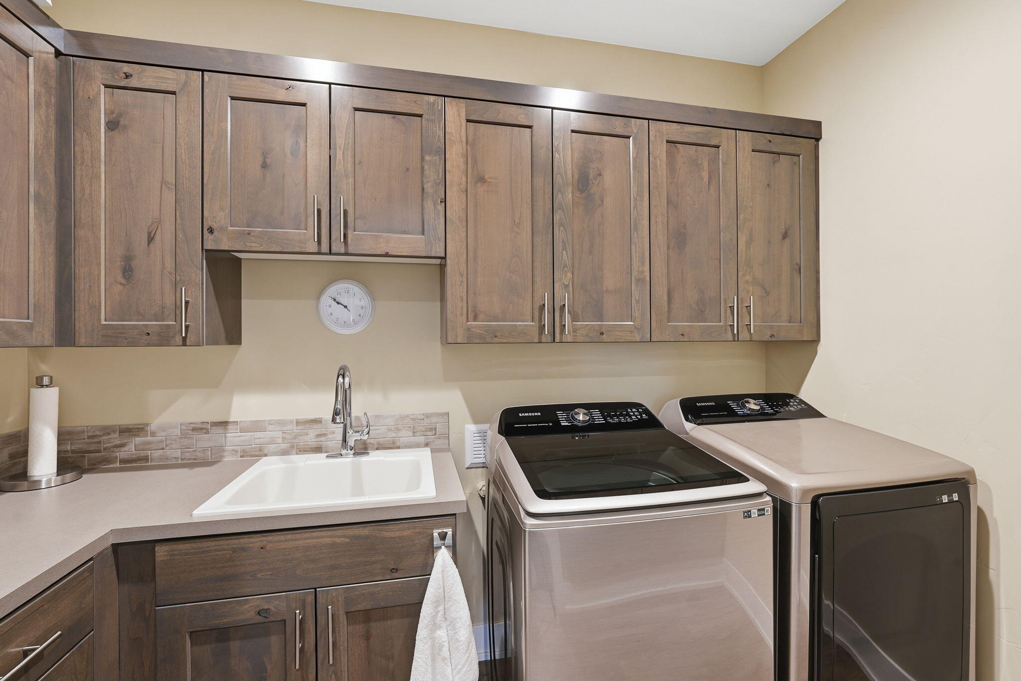 2714 Northwest 23rd Street Redmond, OR 97756 - Photo 31 of 57 a utility room with sink dryer and washer
