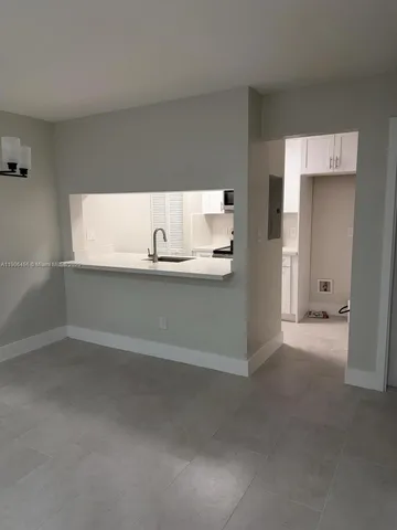 a view of a room with an empty space