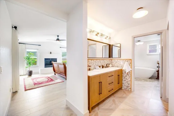 a bathroom with a sink and a mirror