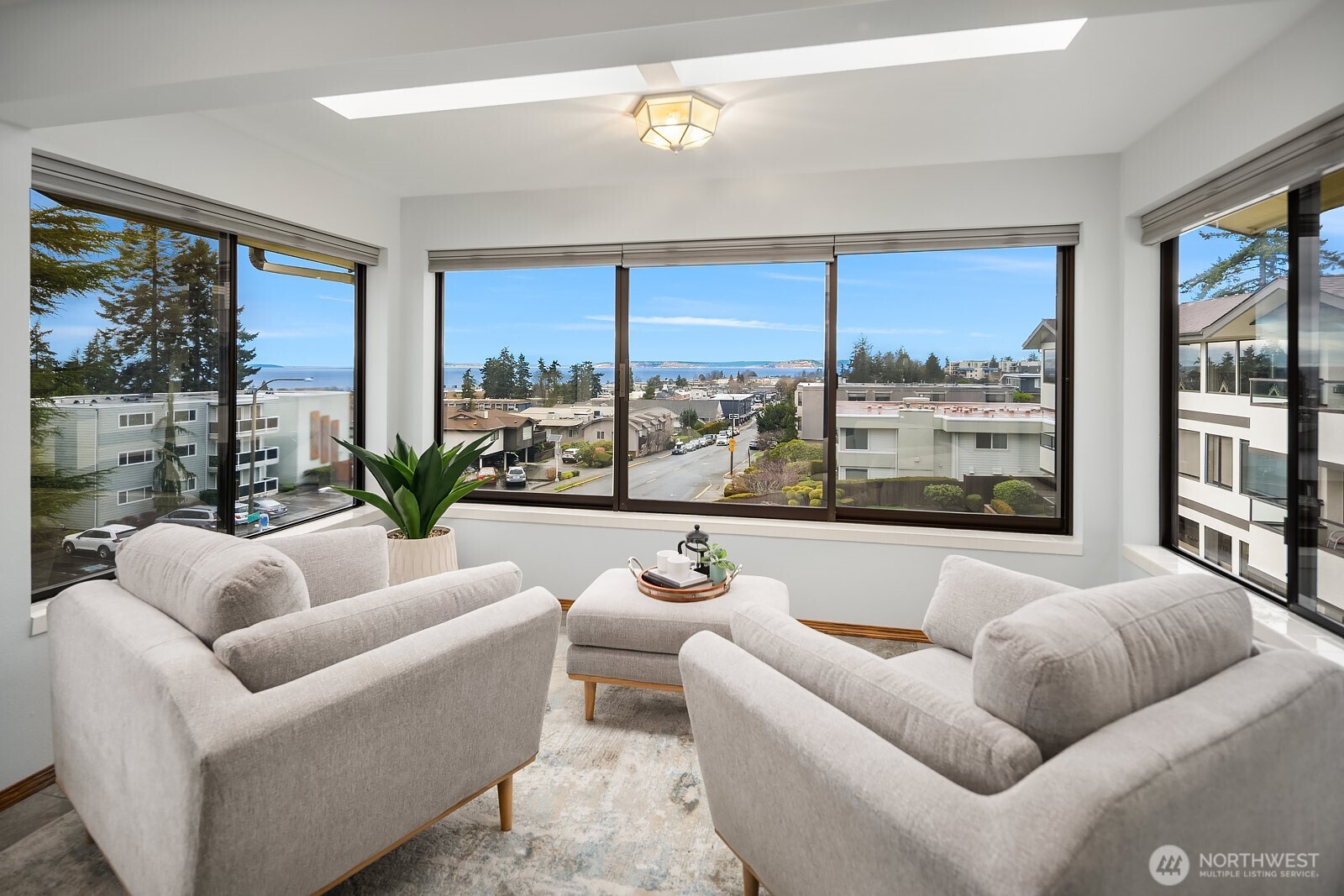 505 Pine Street, Unit 301 Edmonds, WA 98020 - Photo 17 of 40 a living room with furniture and a large window