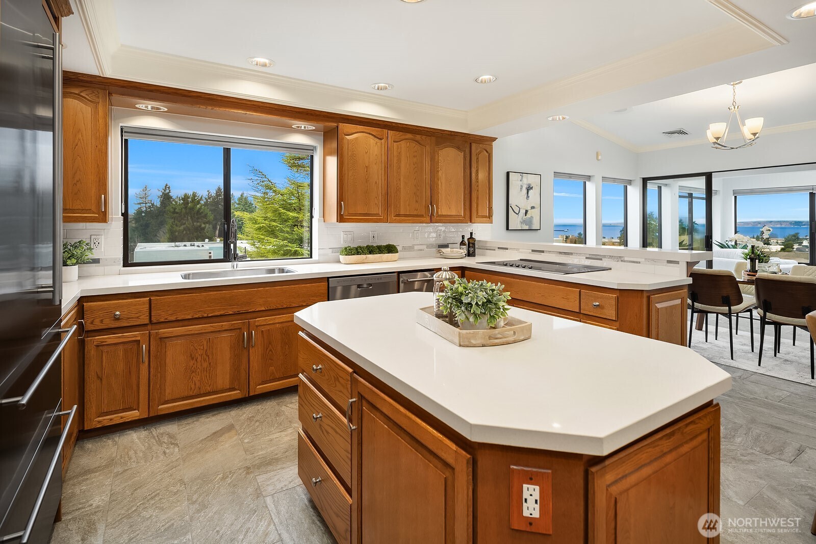 505 Pine Street, Unit 301 Edmonds, WA 98020 - Photo 20 of 40 a kitchen with a stove a sink and a refrigerator