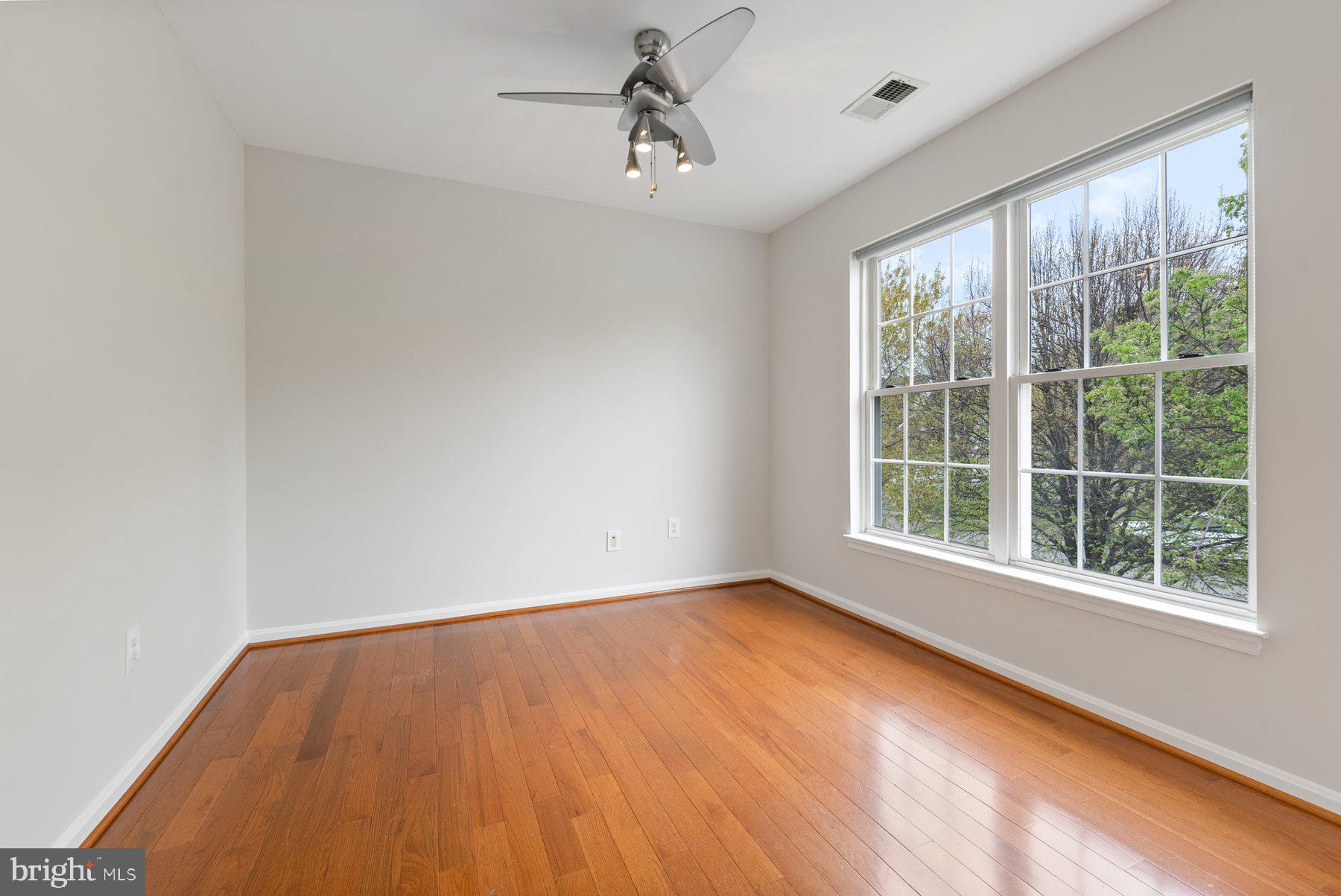 850 Sunny Chapel Road Odenton, MD 21113 - Photo 31 of 53 a view of room with window and hardwood floor