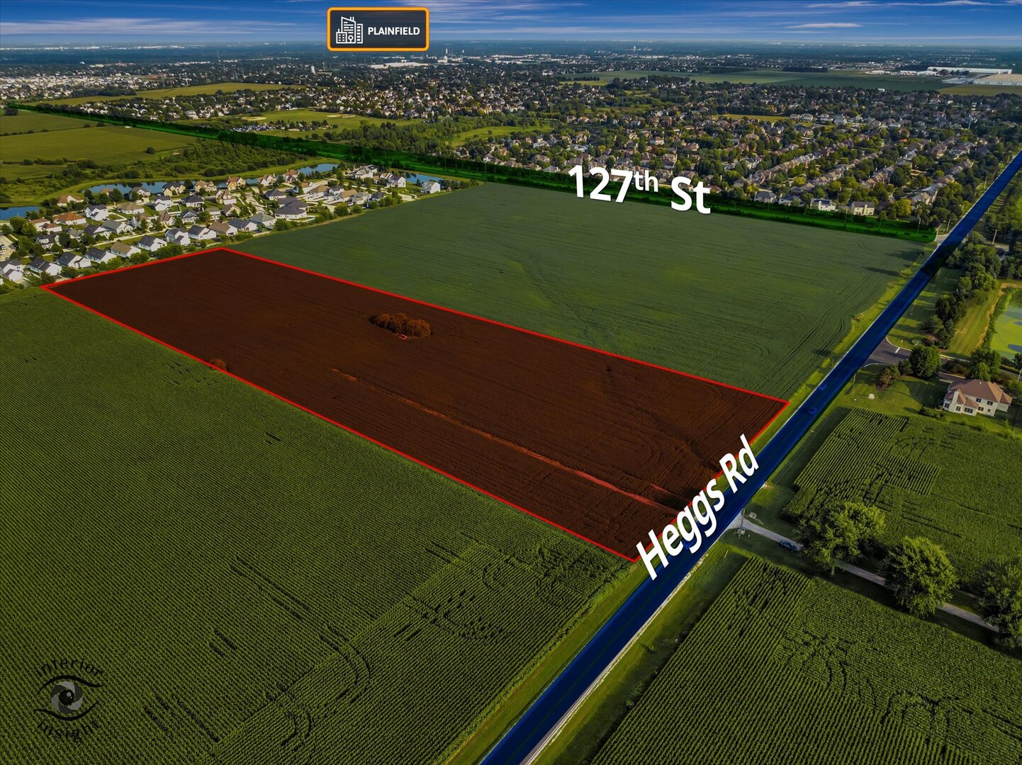 10.38-acres South Heggs Road Plainfield, IL 60585 - Photo 20 of 28 a view of a lake with a outdoor space