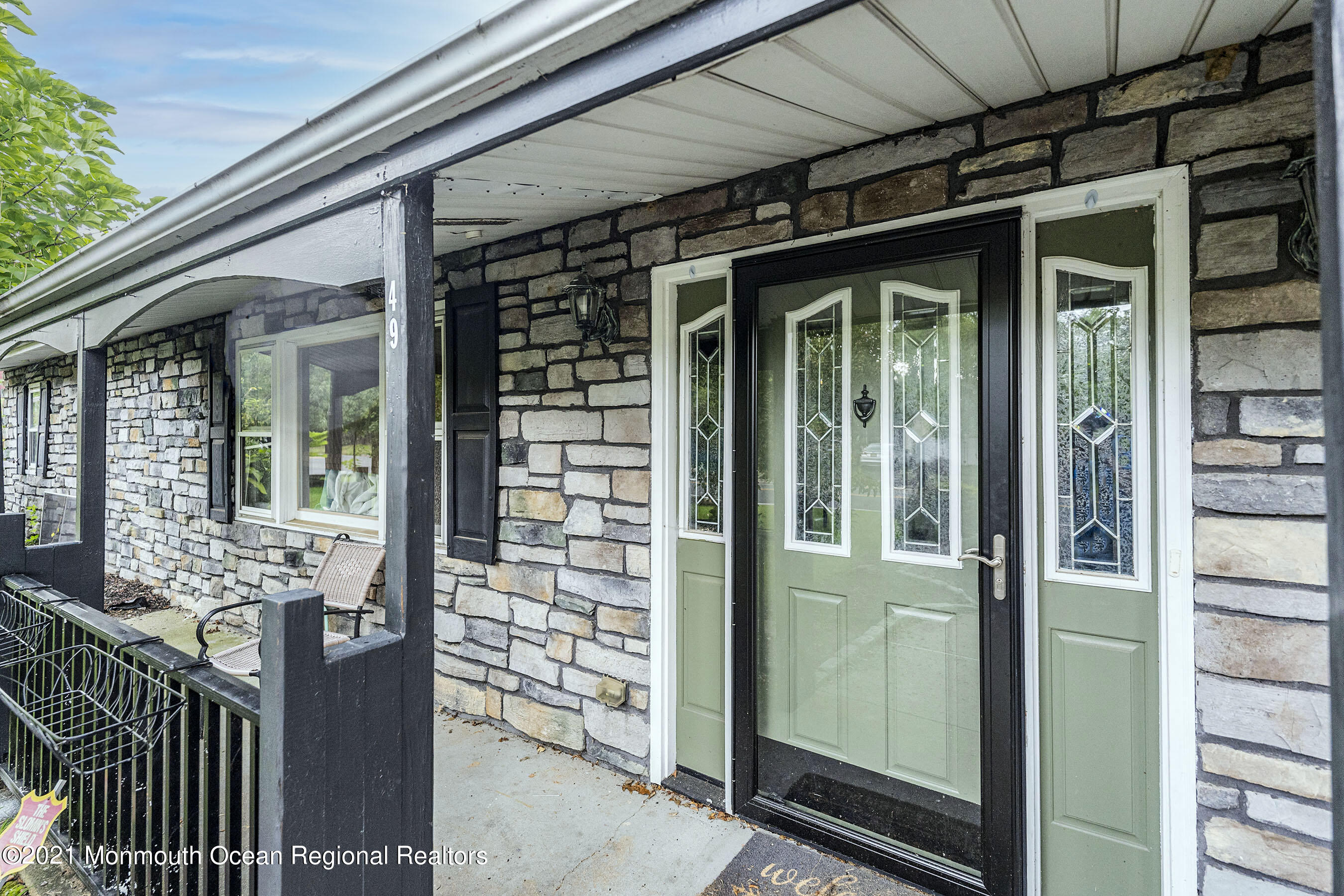 49 South Cooks Bridge Road Jackson, NJ 08527 - Photo 3 of 43 front view of a house with a glass door