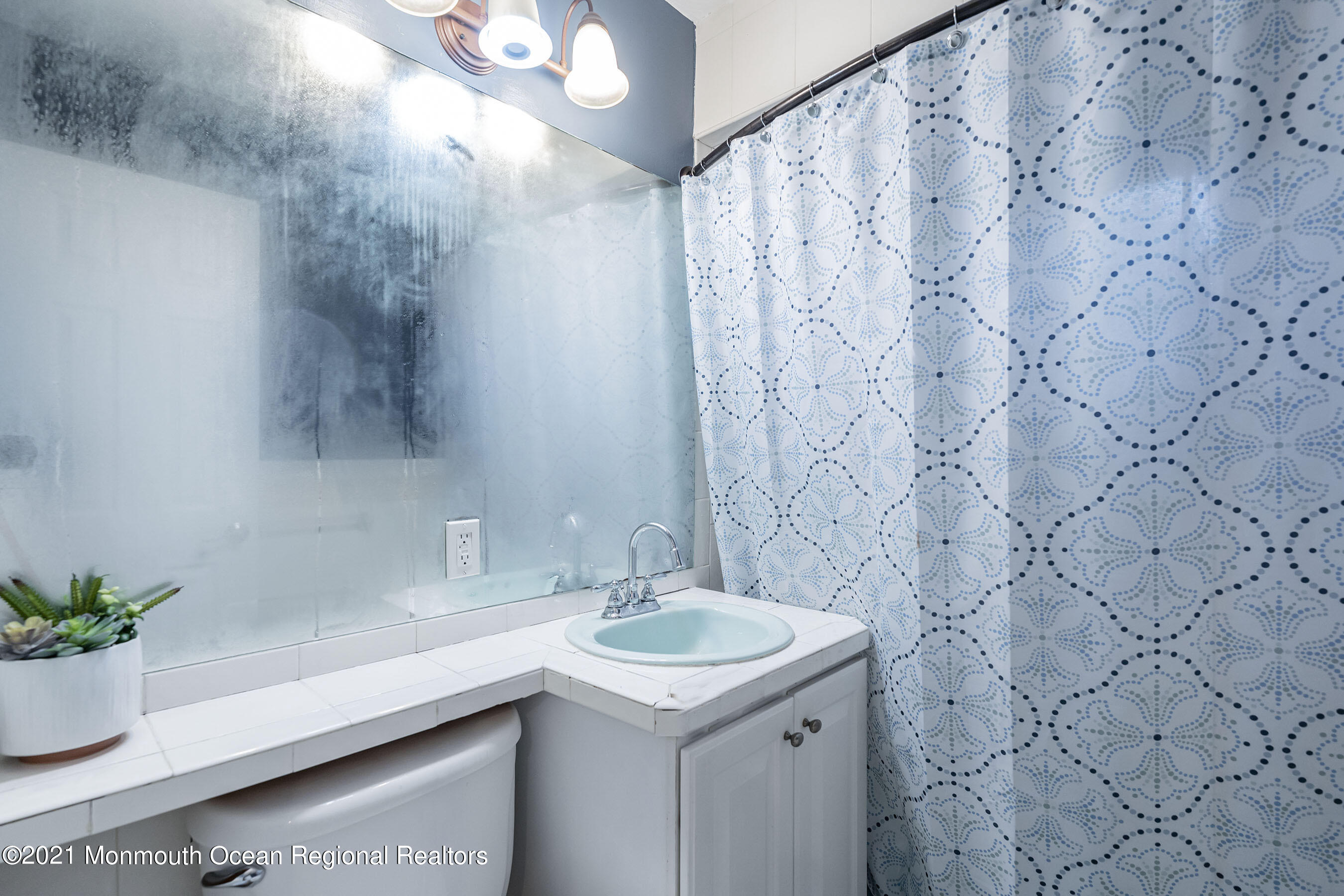 49 South Cooks Bridge Road Jackson, NJ 08527 - Photo 22 of 43 a bathroom with a sink and a mirror