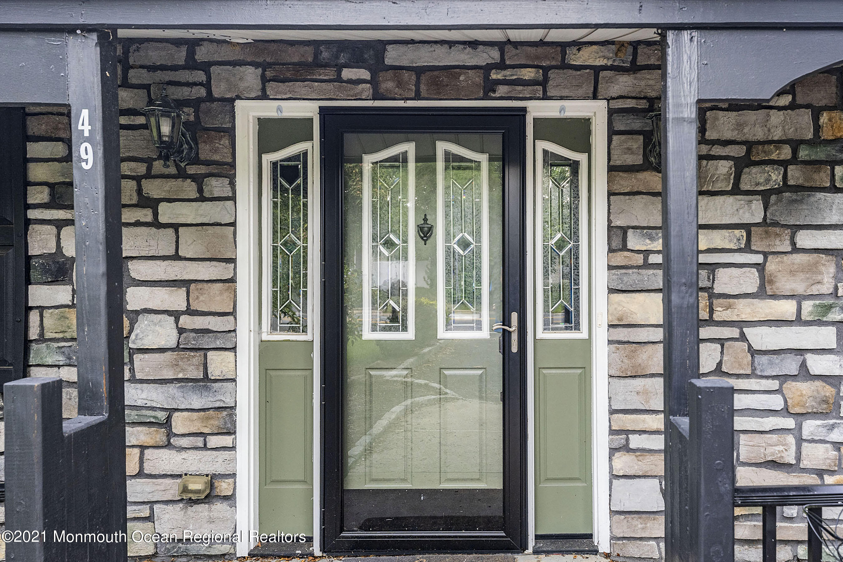 49 South Cooks Bridge Road Jackson, NJ 08527 - Photo 4 of 43 a front view of a building with a glass door